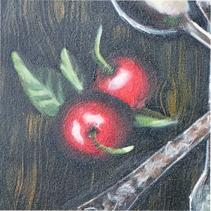 round still life silverware and cherries